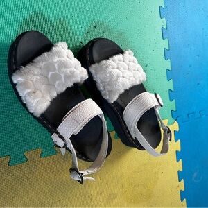 Dr. Martens Black Platform Sandals with White Fluffy Strap